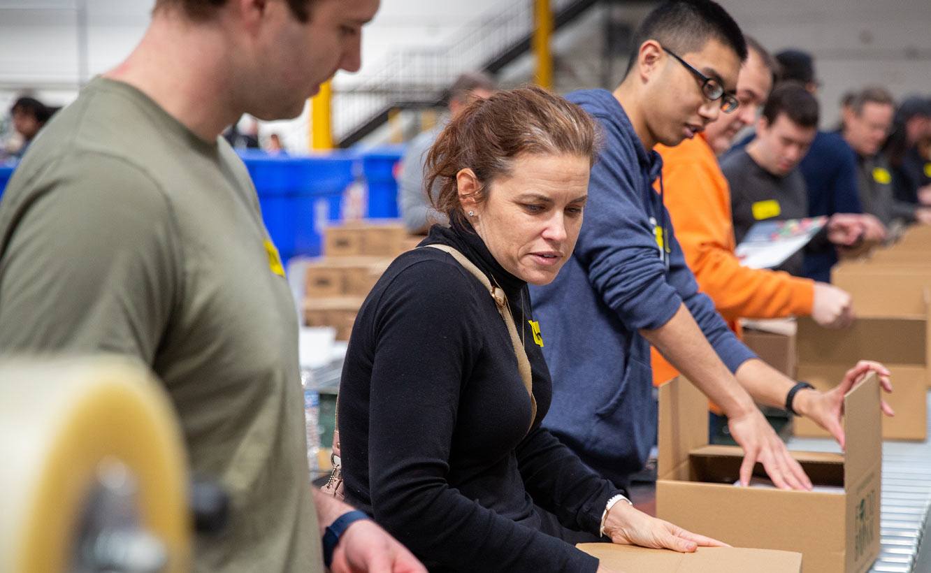 Team packing boxes